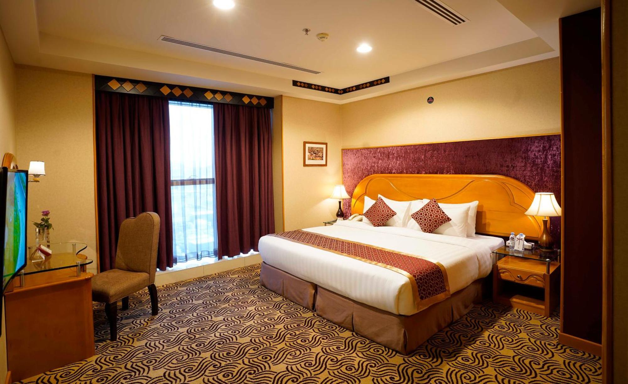 Awaliv International Hotel Ta'if Habitación foto A bedroom at the hotel